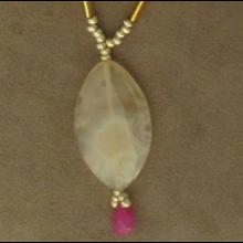 Collier avec deux pi�ces en bronze Song